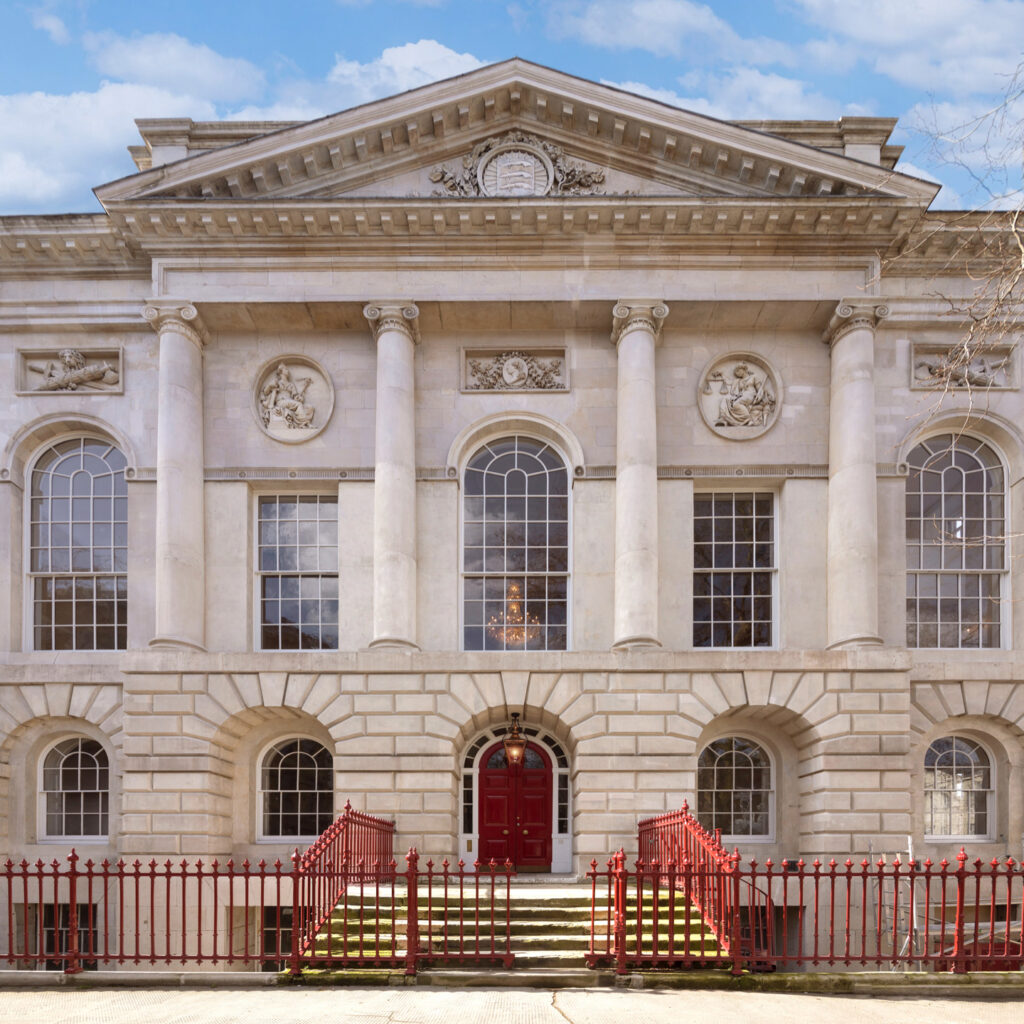 The stately exterior of Old Sessions House, highlighting its classic architecture and grand entrance.