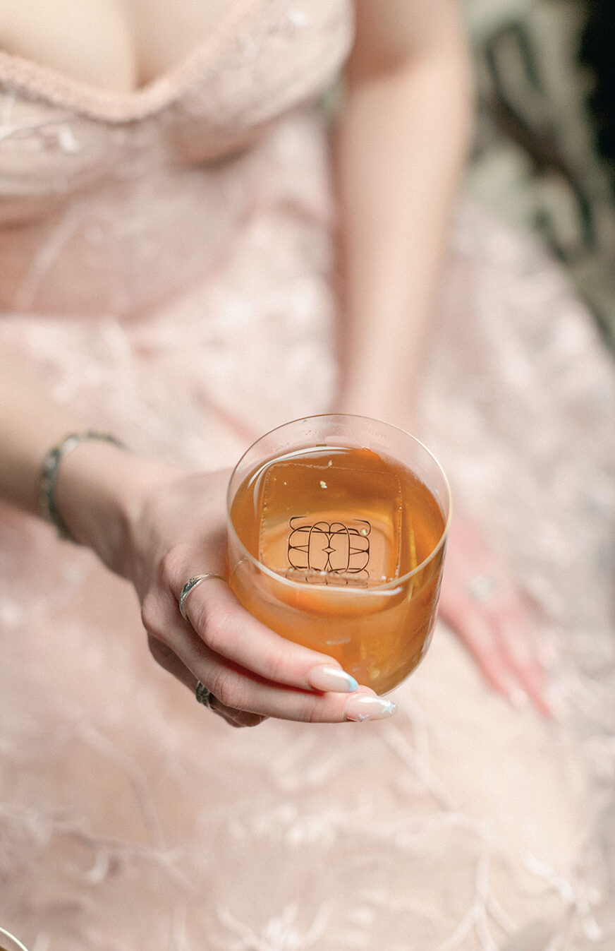 Close-up of a bespoke ice cube with a logo design, created by Esteem London for the sophisticated style of Events by James.