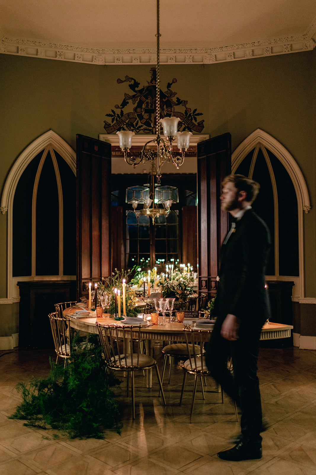 wedding event planner london. walking across the dinning room at Nonsuch mansion